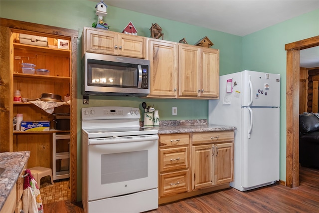 6343 Packer Creek Rd, Haugan, MT 59842 - kitchen with white appliances, light brown cabinetry, dark wood finished floors, and light countertops