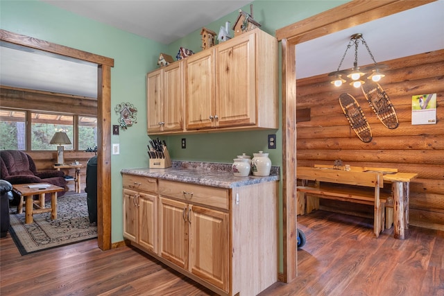 6343 Packer Creek Rd, Haugan, MT 59842 - kitchen with rustic walls, dark wood-style floors, light brown cabinetry, and light countertops