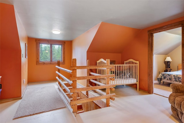 6343 Packer Creek Rd, Haugan, MT 59842 - stairway featuring vaulted ceiling and carpet
