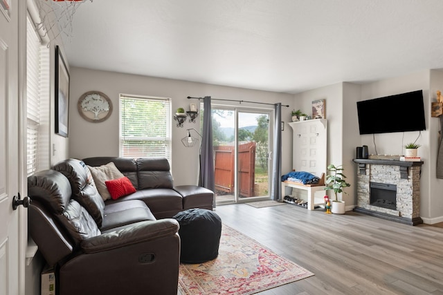 2331 W Sussex Ave, Missoula, MT 59801 - living area featuring wood finished floors and a stone fireplace