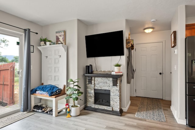 2331 W Sussex Ave, Missoula, MT 59801 - living room with light wood finished floors and a fireplace