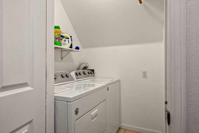 2331 W Sussex Ave, Missoula, MT 59801 - laundry room featuring washing machine and dryer and light tile patterned floors