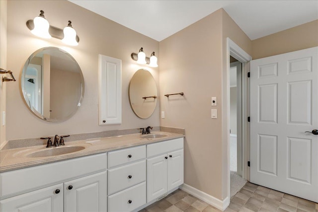 40 Butch Cassidy Loop, Great Falls, MT 59405 - full bath featuring double vanity and baseboards