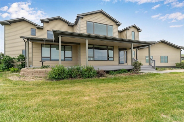 40 Butch Cassidy Loop, Great Falls, MT 59405 - view of front of house featuring covered porch and a front yard