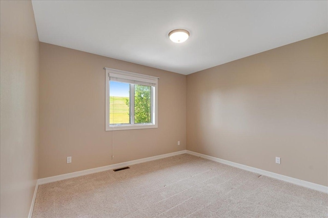 40 Butch Cassidy Loop, Great Falls, MT 59405 - unfurnished room with light carpet and baseboards