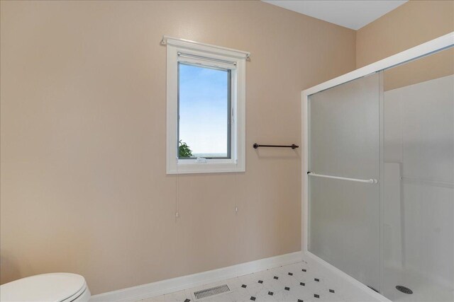 40 Butch Cassidy Loop, Great Falls, MT 59405 - bathroom featuring a shower stall and toilet