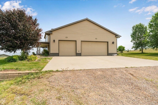 40 Butch Cassidy Loop, Great Falls, MT 59405 - view of front of house with a garage and driveway