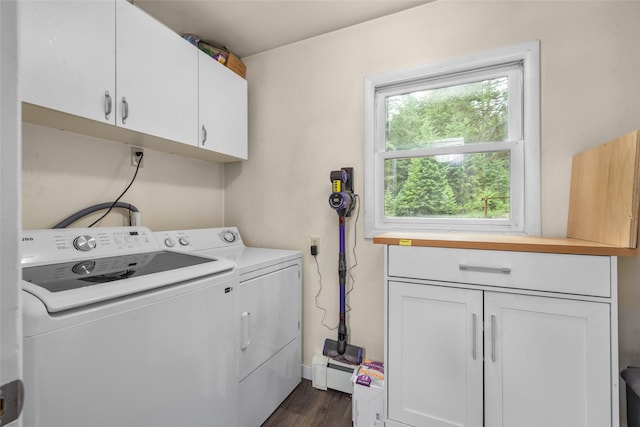 155 Lake Peter Ct, Kalispell, MT 59901 - laundry area with cabinet space, washing machine and clothes dryer, and dark wood finished floors