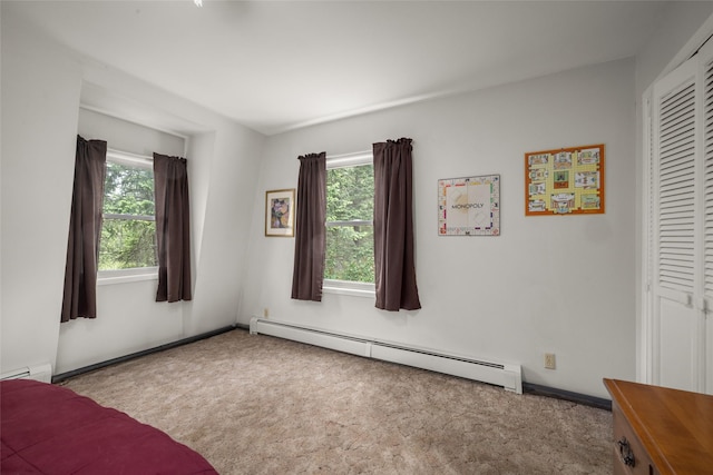 155 Lake Peter Ct, Kalispell, MT 59901 - unfurnished bedroom featuring baseboard heating and carpet