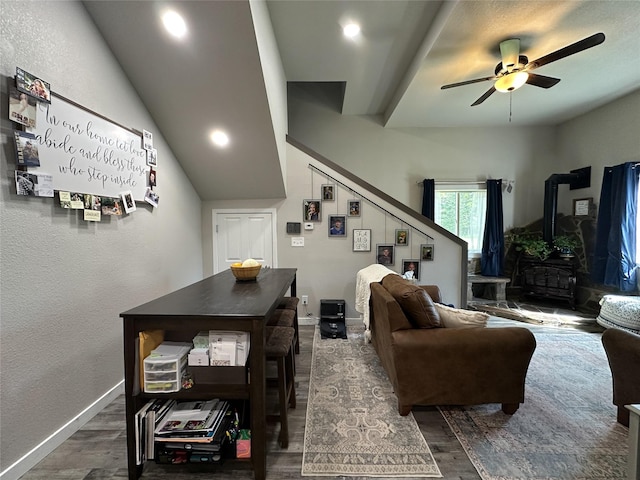 86 Steamboat Way W, Thompson Falls, MT 59873 - living room with a wood stove, wood finished floors, a ceiling fan, stairs, and a textured wall