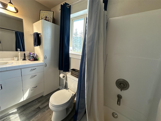 86 Steamboat Way W, Thompson Falls, MT 59873 - bathroom with vanity, wood finished floors, and shower / bath combo with shower curtain
