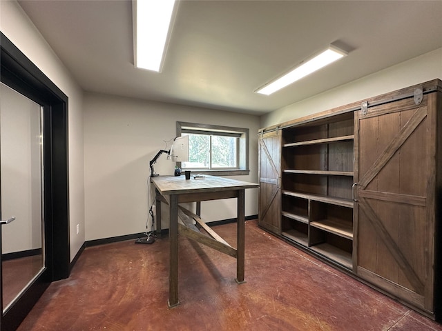 86 Steamboat Way W, Thompson Falls, MT 59873 - unfurnished office with concrete floors and a barn door