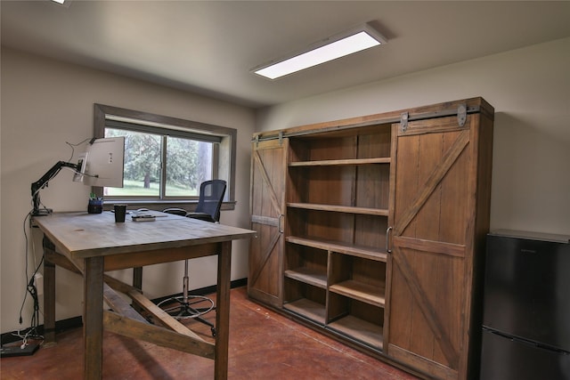 86 Steamboat Way W, Thompson Falls, MT 59873 - home office featuring a barn door and concrete flooring