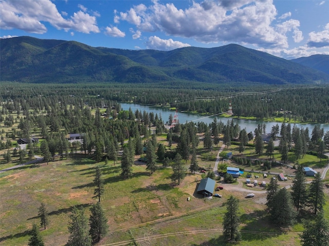 86 Steamboat Way W, Thompson Falls, MT 59873 - drone / aerial view of a heavily wooded area and a water and mountain view