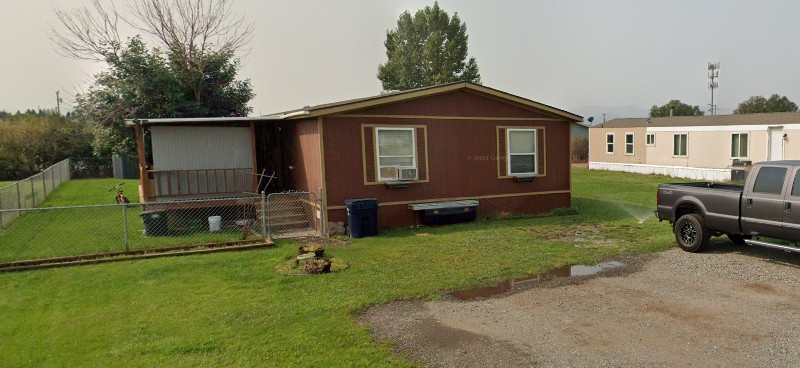 3247 Derek Rd Unit 54, Helena, MT 59602 - view of front of home with cooling unit