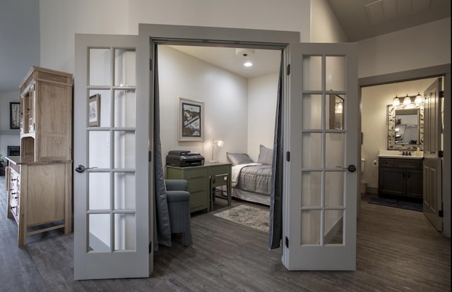 281 W Nicklaus Ave, Kalispell, MT 59901 - corridor featuring dark wood-type flooring, french doors, and vaulted ceiling