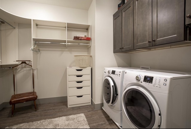 281 W Nicklaus Ave, Kalispell, MT 59901 - washroom featuring cabinet space, washing machine and dryer, and dark wood-style floors