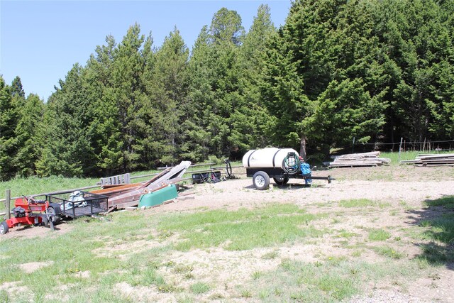 6570 Blossburg Rd, Canyon Creek, MT 59633 - view of yard featuring a forest view