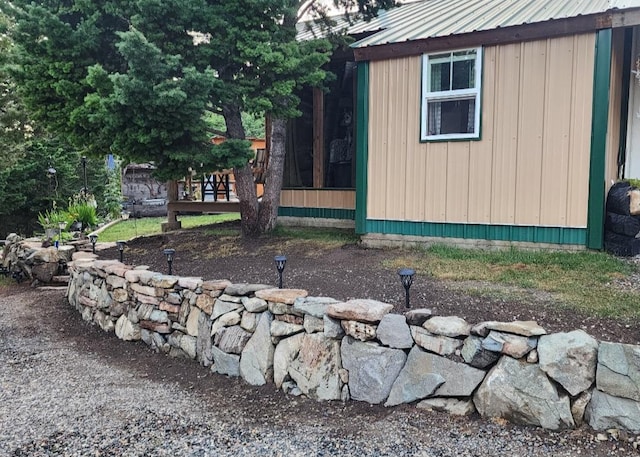 6570 Blossburg Rd, Canyon Creek, MT 59633 - view of home's exterior featuring a metal roof and an outbuilding