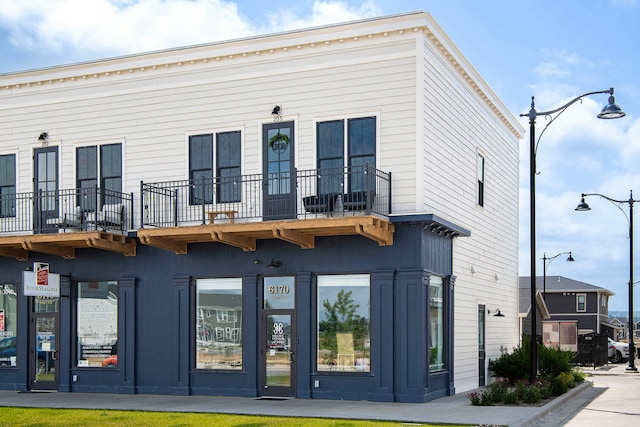 6170 Elysian Rd Unit 103-203, Billings, MT 59101 - back of property featuring a balcony