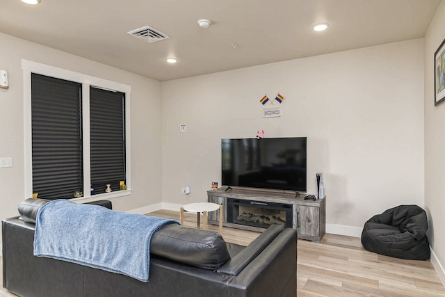 6170 Elysian Rd Unit 103-203, Billings, MT 59101 - living room featuring wood finished floors and recessed lighting