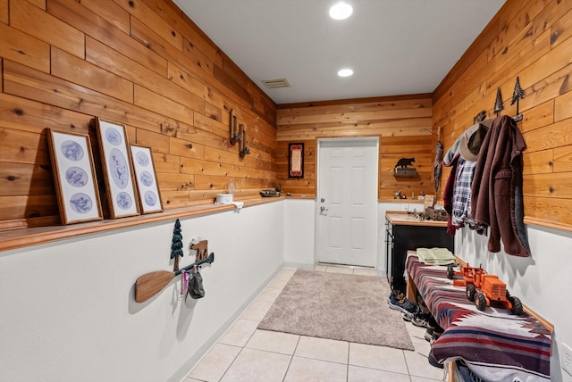 6350 S Meadowwood Ln, Missoula, MT 59803 - mudroom with wood walls, light tile patterned flooring, and recessed lighting