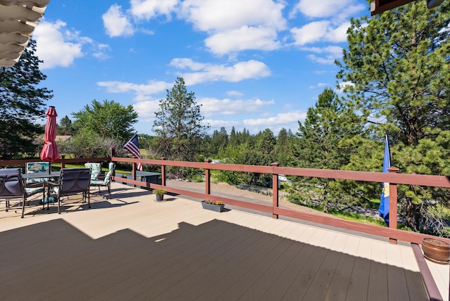6350 S Meadowwood Ln, Missoula, MT 59803 - wooden deck with outdoor dining area