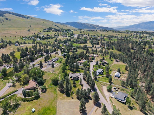 6350 S Meadowwood Ln, Missoula, MT 59803 - aerial overview of property's location with a mountain backdrop