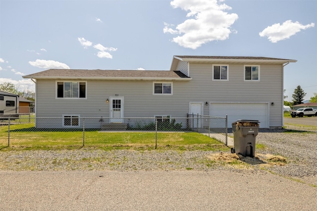 701 E Lewis St, East Helena, MT 59635 - rear view of house with an attached garage