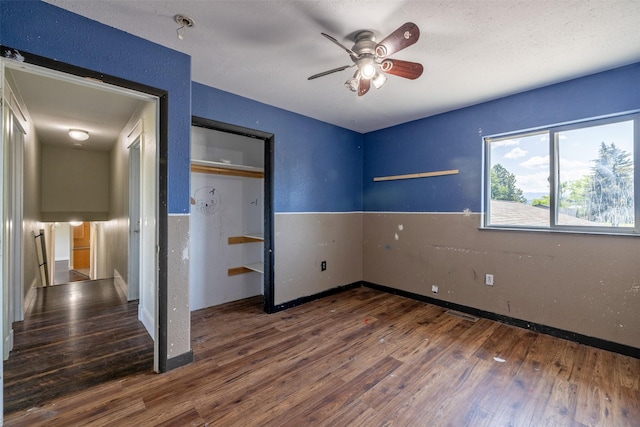 701 E Lewis St, East Helena, MT 59635 - unfurnished bedroom featuring wood finished floors, a closet, and ceiling fan