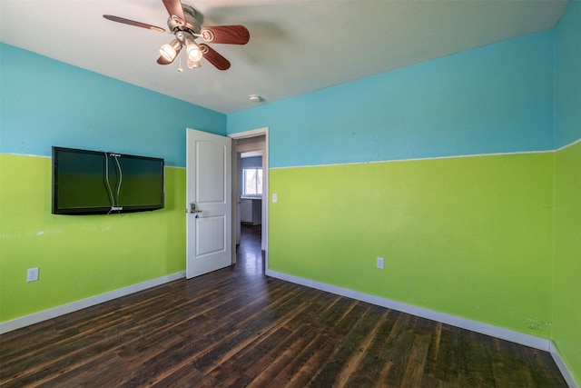 701 E Lewis St, East Helena, MT 59635 - unfurnished bedroom with dark wood-style flooring and a ceiling fan
