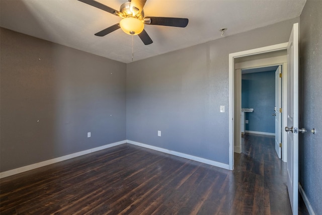 701 E Lewis St, East Helena, MT 59635 - empty room with dark wood-style floors and ceiling fan