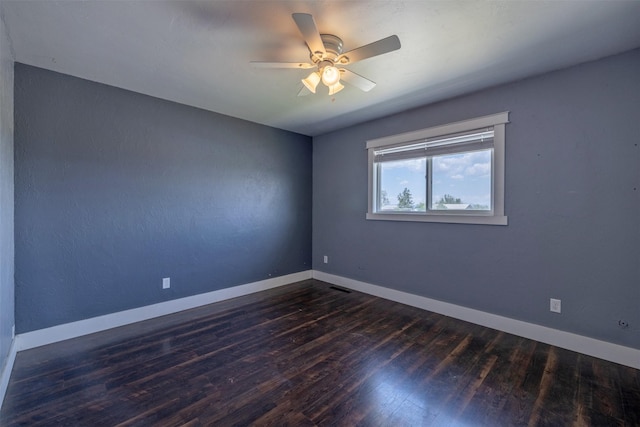 701 E Lewis St, East Helena, MT 59635 - unfurnished room with dark wood-type flooring and a ceiling fan