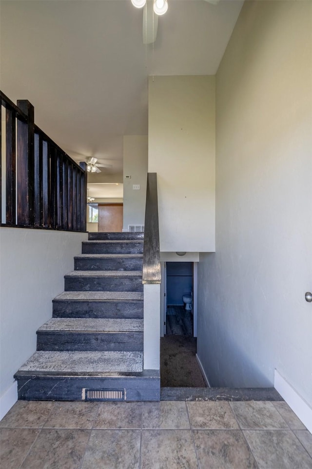 701 E Lewis St, East Helena, MT 59635 - stairs featuring a ceiling fan and baseboards