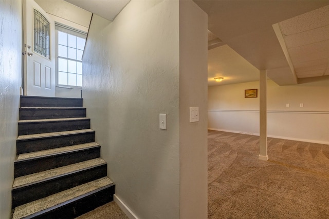 701 E Lewis St, East Helena, MT 59635 - staircase featuring carpet floors and baseboards