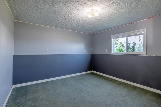 701 E Lewis St, East Helena, MT 59635 - unfurnished room with carpet floors and a textured ceiling