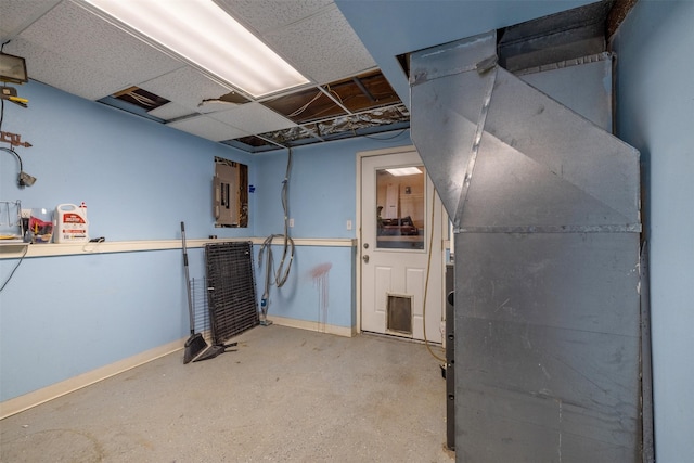 701 E Lewis St, East Helena, MT 59635 - finished below grade area featuring a drop ceiling and electric panel