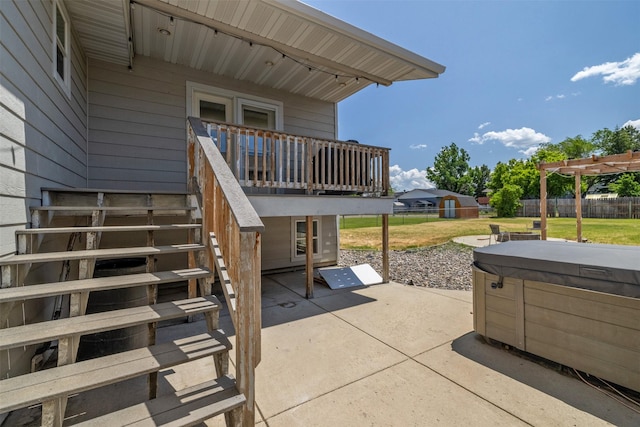 701 E Lewis St, East Helena, MT 59635 - view of patio / terrace with a hot tub, stairs, a deck, and a pergola
