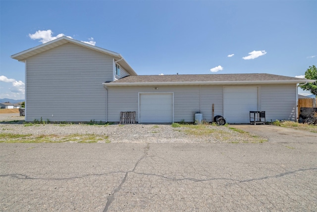 701 E Lewis St, East Helena, MT 59635 - view of side of home with a garage