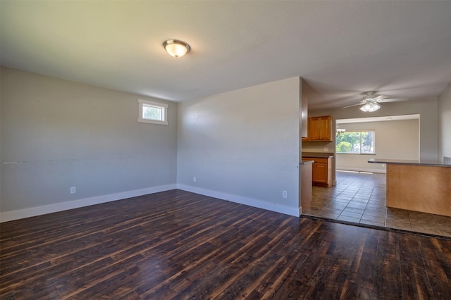 701 E Lewis St, East Helena, MT 59635 - spare room with wood finished floors and ceiling fan