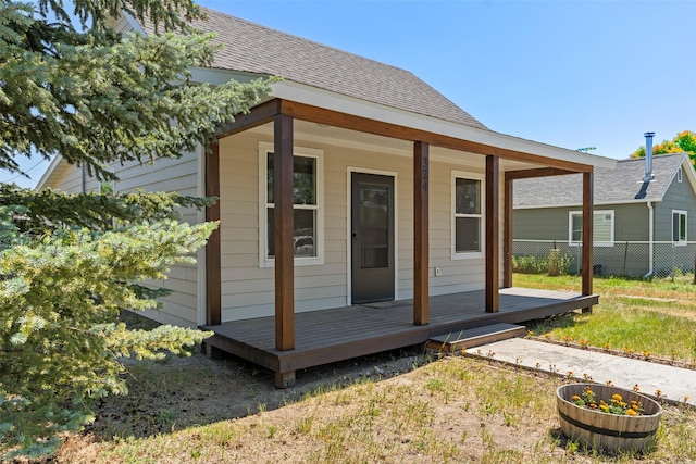 324 N Pine St, Townsend, MT 59644 - rear view of property with a shingled roof