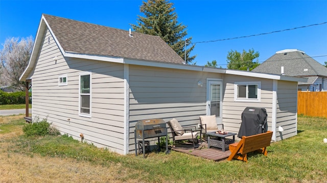 324 N Pine St, Townsend, MT 59644 - rear view of house featuring a fire pit and a shingled roof