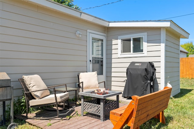 324 N Pine St, Townsend, MT 59644 - wooden terrace featuring a fire pit and a grill