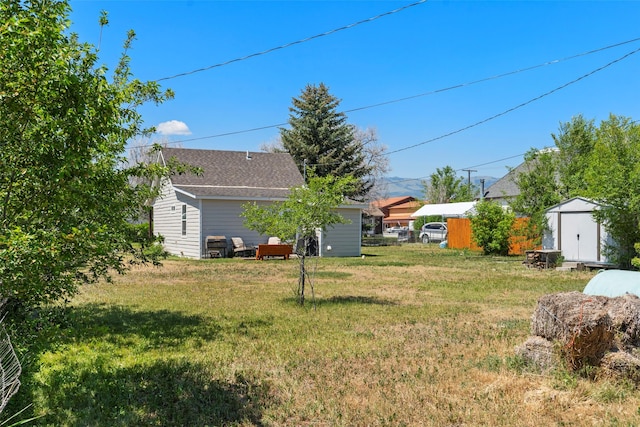 324 N Pine St, Townsend, MT 59644 - view of grassy yard with a storage shed