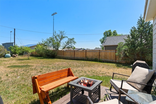 324 N Pine St, Townsend, MT 59644 - fenced backyard with an outdoor fire pit