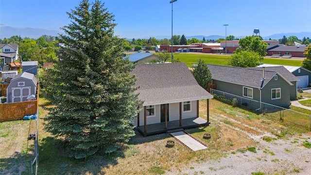 324 N Pine St, Townsend, MT 59644 - aerial view of residential area with a mountain backdrop