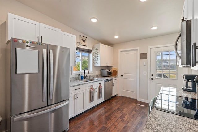 324 N Pine St, Townsend, MT 59644 - kitchen featuring stainless steel appliances, dark wood-type flooring, white cabinetry, light stone counters, and recessed lighting