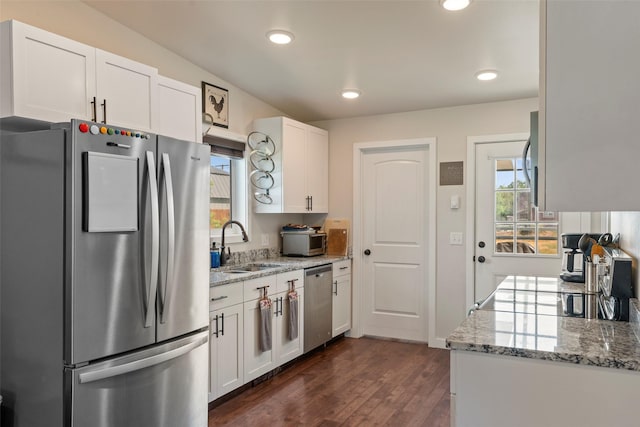 324 N Pine St, Townsend, MT 59644 - kitchen featuring stainless steel appliances, dark wood-type flooring, white cabinets, light stone countertops, and recessed lighting