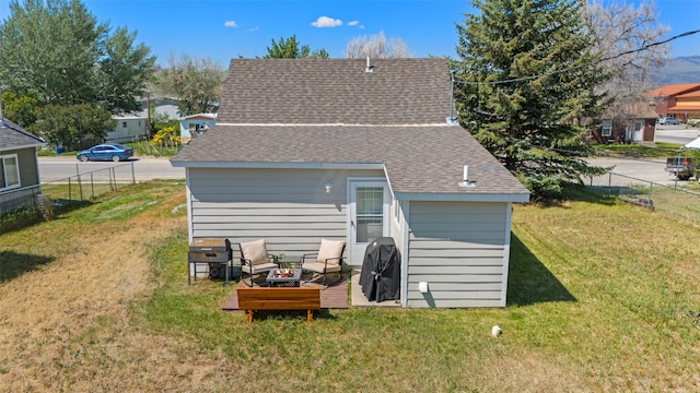 324 N Pine St, Townsend, MT 59644 - rear view of house with a shingled roof