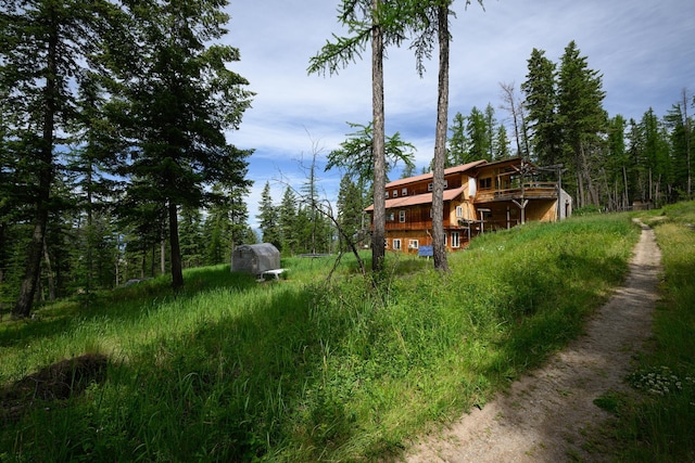 456 Gould Rd, Eureka, MT 59917 - view of yard featuring a wooded view